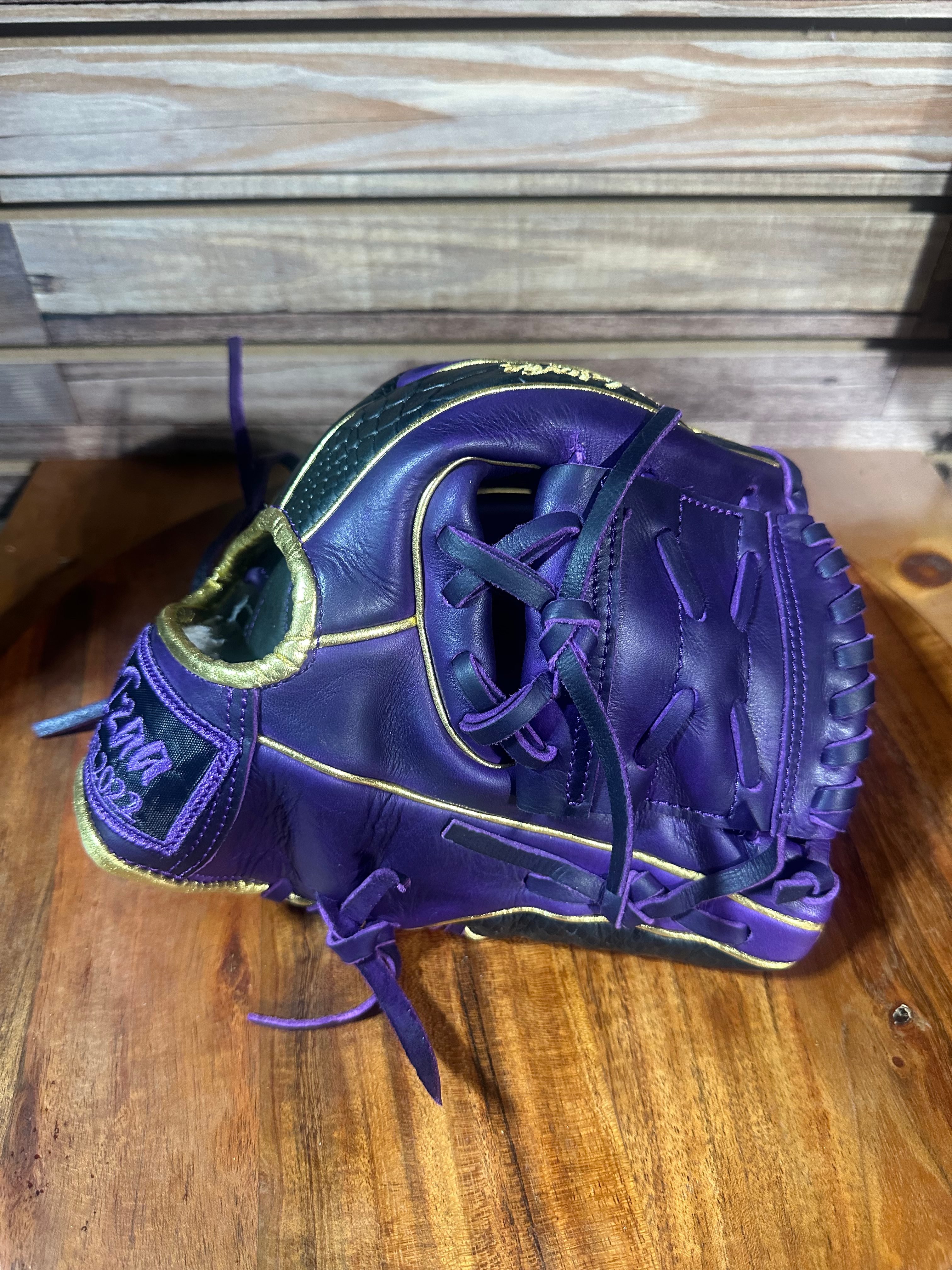 11.5” purple/snake black extra padding oiled and broken in