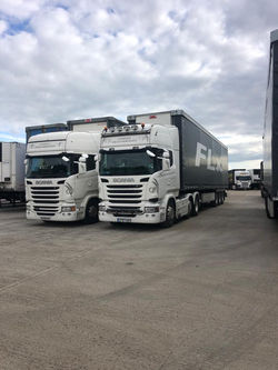 Cotswold Forage Lorries Side by Side