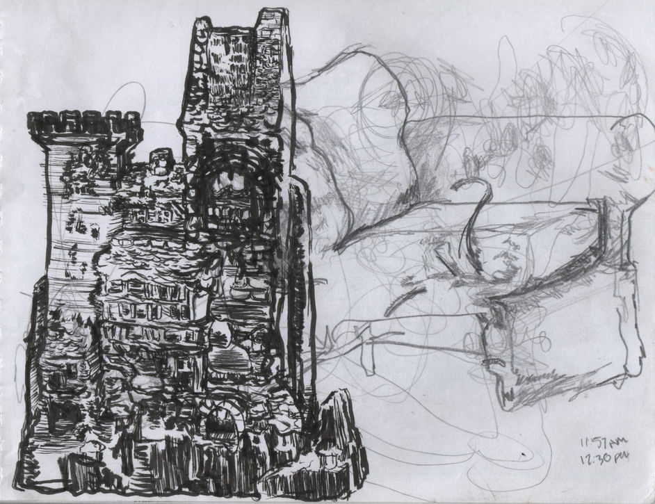 toy castle on the right and sofa cut in half with springs coming out of the cushions on the right. more scribbles in the back and 11:57am with 12:30pm underneath it on the bottom right.