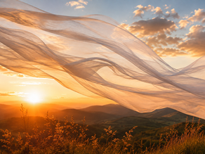 White flowing fabric in the golden sunlight symbolizing God's banner of love