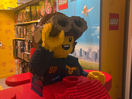 Large LEGO sculpture inside the LEGO airport shop in Salt Lake City, reminding us how many small pieces come together to create something beautiful.