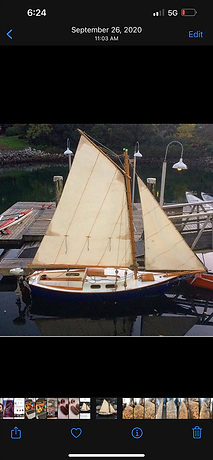 small gaff rigged sailboat