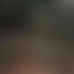 tween girl in stylish fall sweater jumping rock to rock