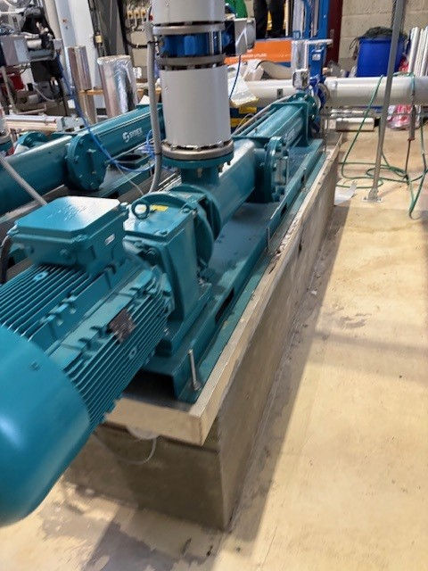 Close-up view of a Torqueflow pump installed in an industrial setting