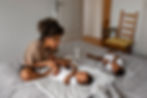 side-view-smiley-mother-with-baby.jpg