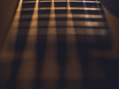 close-up photo of guitar strings