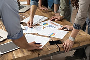 a team reviewing documents