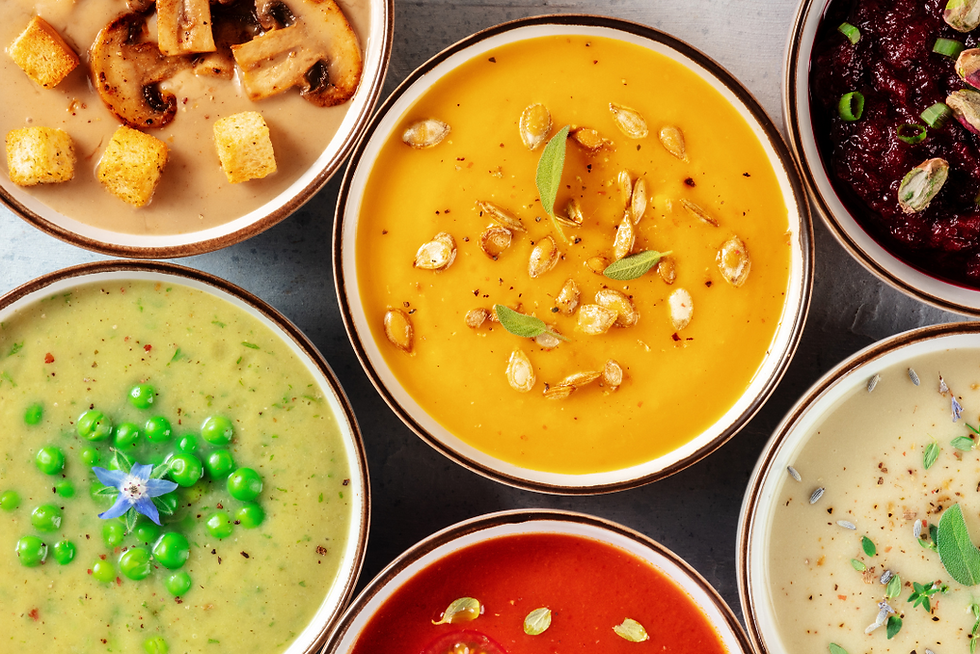 Several bowls of different soups