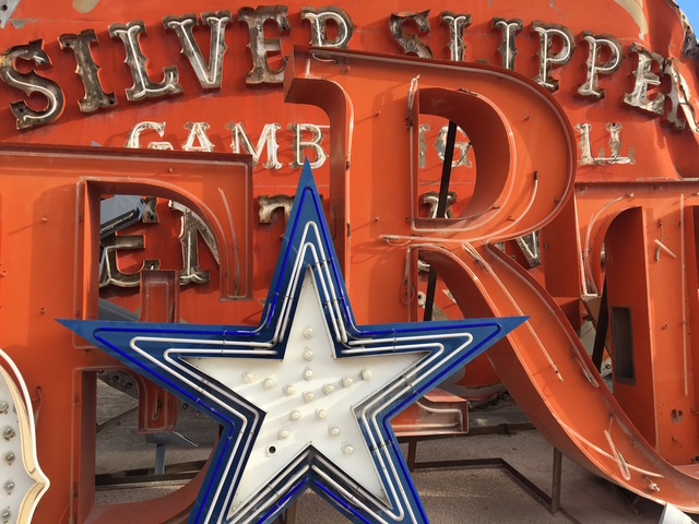 Outdoor arrangement of old neon signs