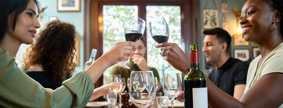 Two women enjoying a glass of wine in a intmate setting (1).jpg