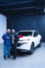 Familia Motor Group clients taking delivery of a new Nissan