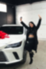Familia Motor Group client celebrating delivery of a new Lexus