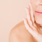 Woman with Hand on Face