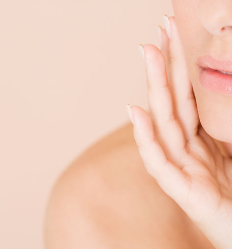 Woman with Hand on Face