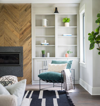 Beautiful herringbone fireplace  with built-in shelves
