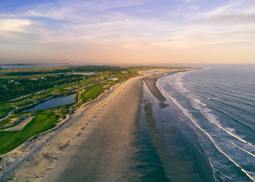 Flew the drone over the beach at sunset, taking this picture looking back at the Ocean Cou