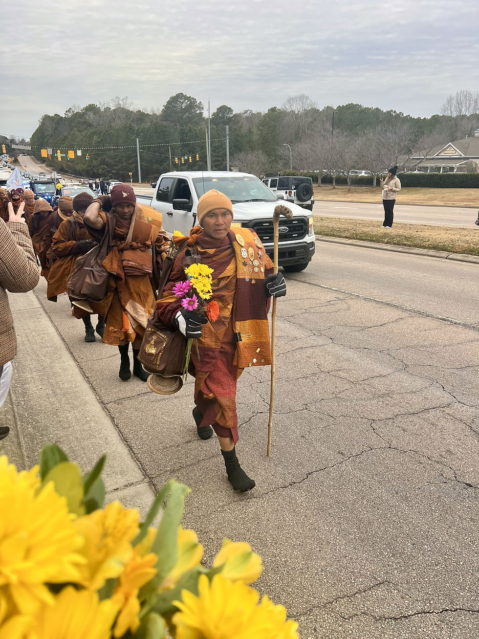 Monks marching for peace near Raleigh, North Carolina in freezing weather some in only socks.  Taken by local resident.