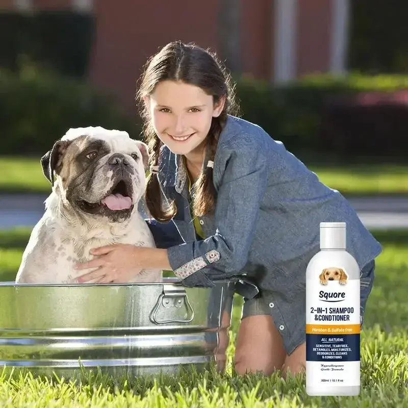 Girl bathing bulldog with 2 in 1 natural puppy shampoo