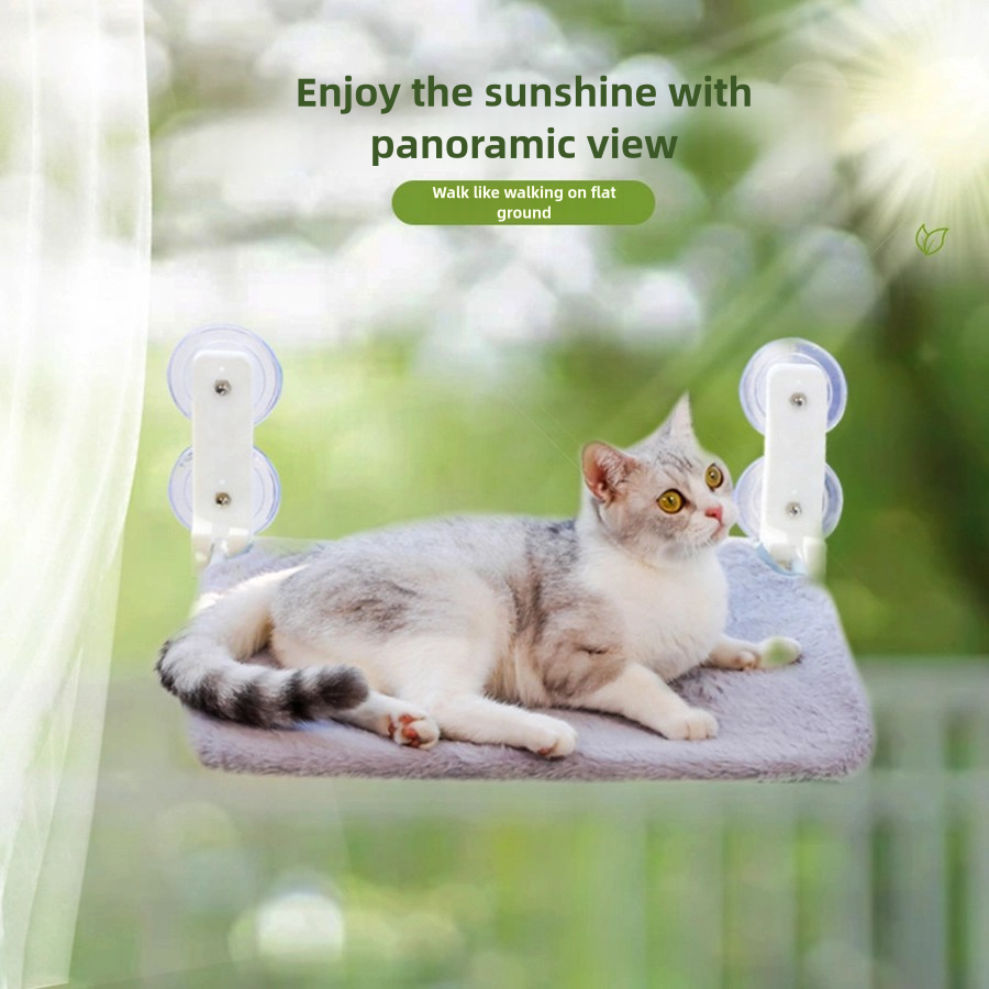 Thumbnail: Cat on a folding cat hammock window perch with panoramic view.