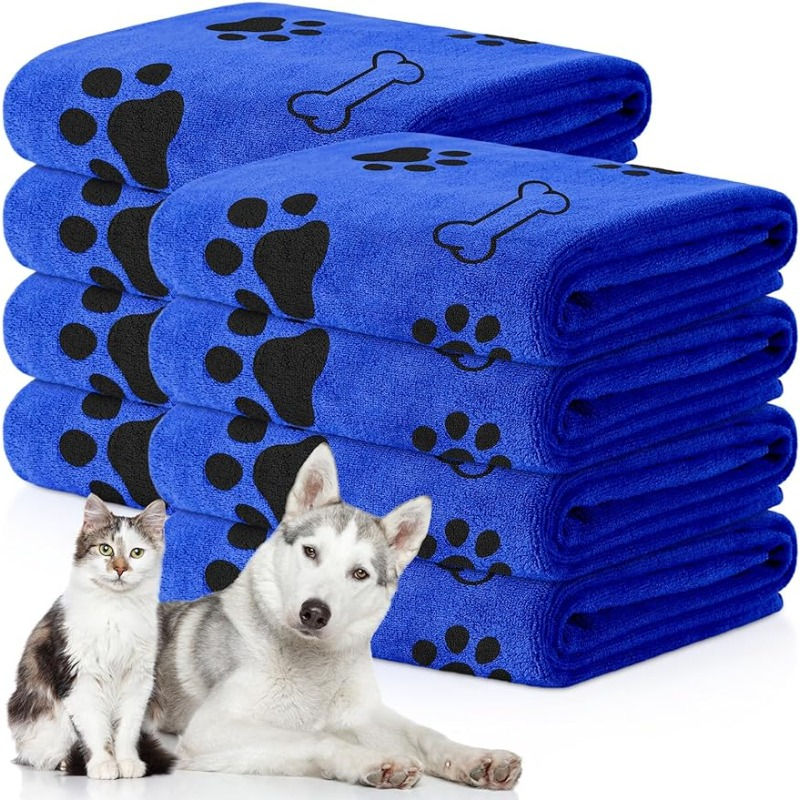 Quick-drying microfiber dog towel with paw and bone prints.
