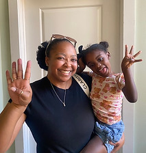 TFG case manager with a participant child. 