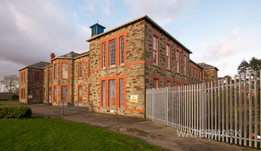 Foster Hall, built in 1901 was the centrepiece of the former lunatic asylum and later hospital of St. Lawrence's in Bodmin. It is an elegant Georgian styled building built of brick and red sandstone. It had been empty since 1994.