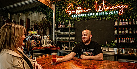 Pieter serving drinks at the bar at Suffoir