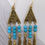 Thumbnail: Turquoise Multi Drop Earrings Feather Charms Gold Plated Pewter Made Australia