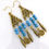 Thumbnail: Turquoise Multi Drop Earrings Feather Charms Gold Plated Pewter Made Australia