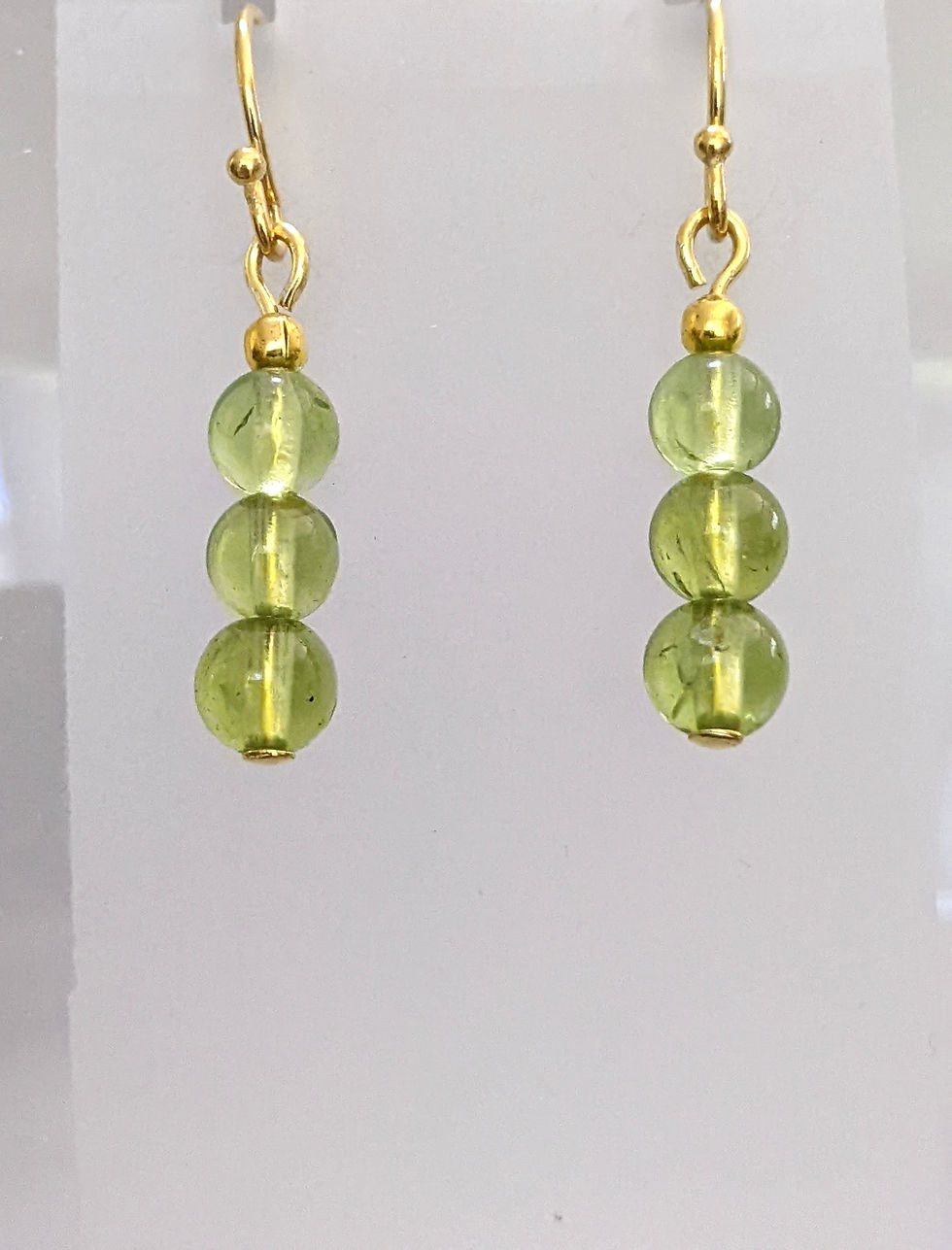 Thumbnail: Dainty Natural Peridot Earrings Handmade in Australia 4mm Beads Gold Plate Hooks