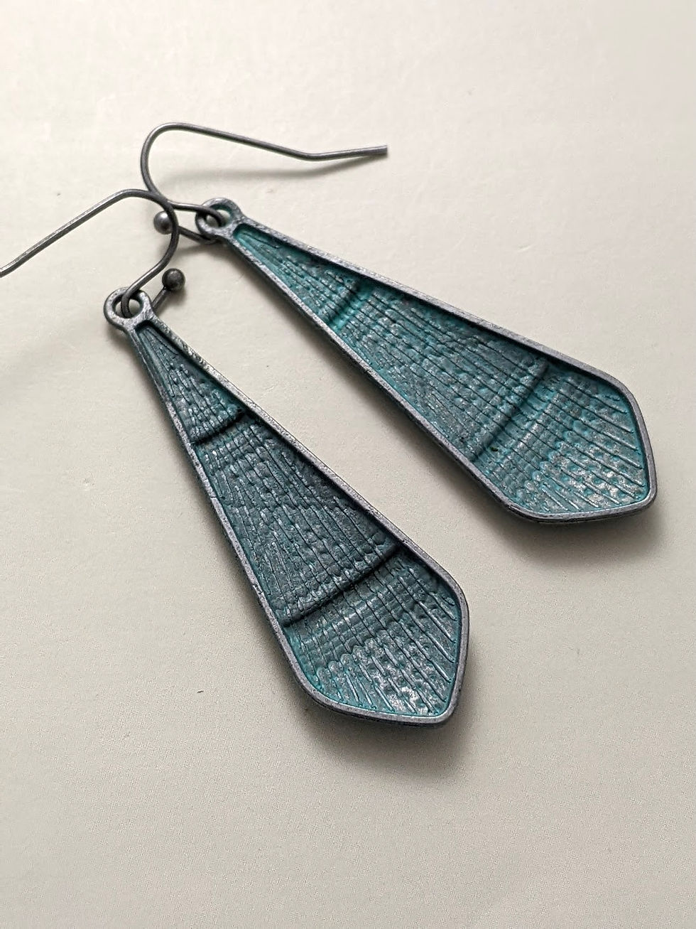 Thumbnail: Teal Patina Earrings Oblong Kite Shape Dots Pattern Dark Silver Metal