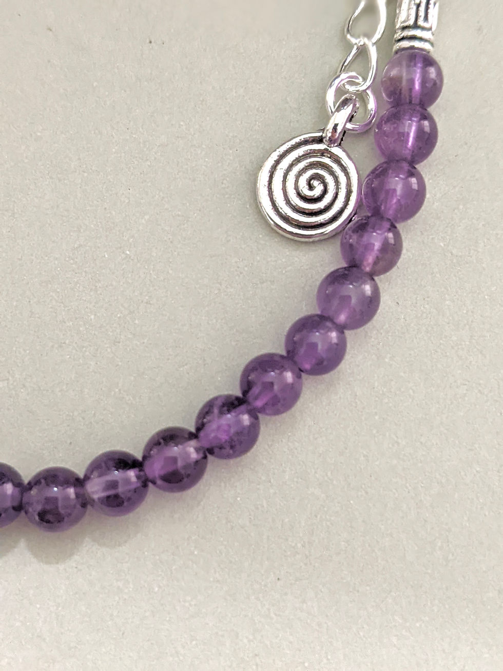 Thumbnail: Natural Amethyst Bracelet Stackable 4mm Healing Beads Secure Clasp Spiral Charm