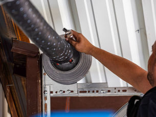 What Causes Garage Door Springs to Break