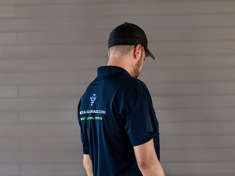 Nexa Garage technician inspecting a garage door