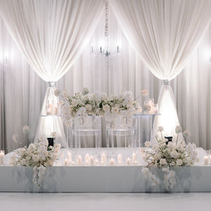 elegant white drapery head table