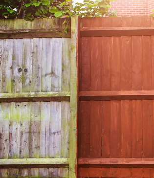 Wood privacy fence before and after professional fence painting by Penrod Lumber & Fence in Ocala, Florida