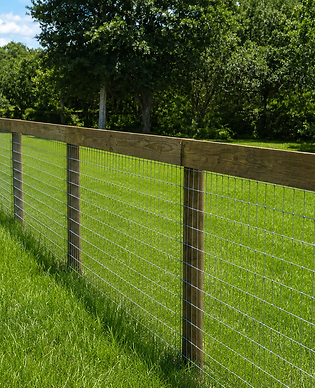 No-climb wire horse fence with wood posts on a Florida horse farm — installed by Penrod Lumber & Fence in Ocala