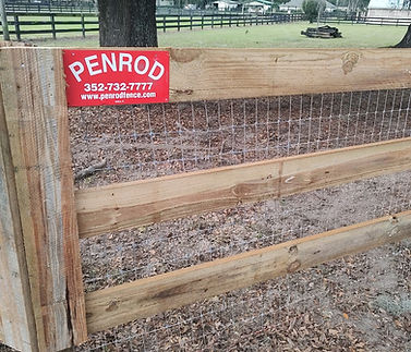 board fence with no climb wire with Penrod Fence Sign