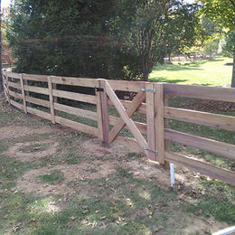 wood horse fence and gate on horse property in Citra, FL