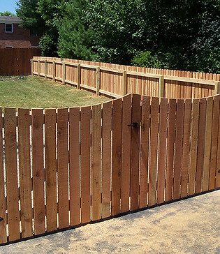 Stained wood privacy fence installed by Penrod Lumber & Fence Company in Ocala, Florida