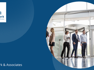 A revolving office door  with business people moving around