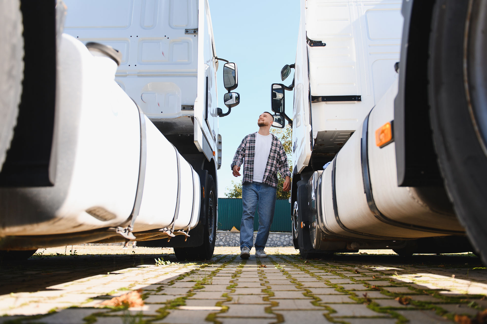 trucks with man in between