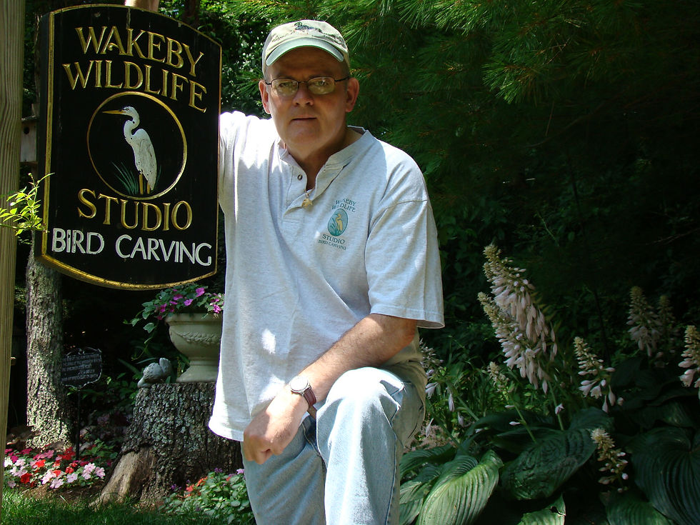 Steve Poses with the Sign