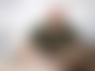 Dr. Jordan Hutchison, chiropractor in Bryanston, sitting at his desk in Hutchison Family Chiropractic clinic, ready to consult patients and provide evidence-based care