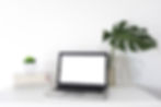 laptop-with-blank-white-screen-office-desk.jpg