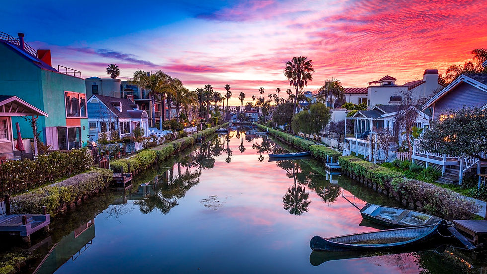 Venice Canals and paths during a purplish-pink dusk.