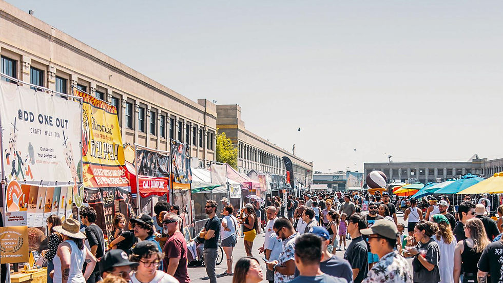Smorgasborg LA at The Row DTLA with lots of people browsing food stands.