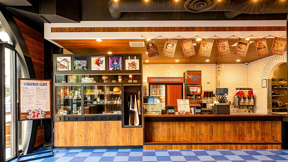 Inside the One Piece Cafe, showcasing the incredible merch such as "Wanted" posters, collectible cups, and more.
