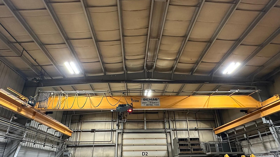 Close-up view of industrial lifting slings and shackles arranged on a rack
