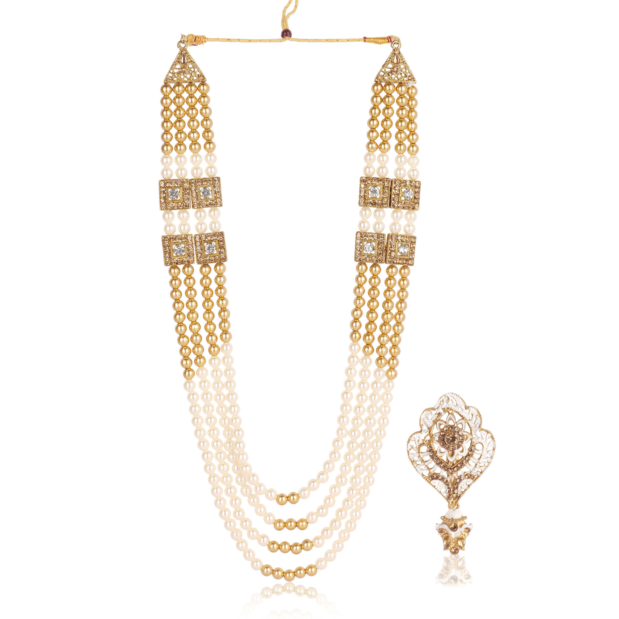 The Sherwani Mala and brooch create a harmonious and balanced look that enhances the groom's appearance on his wedding day.